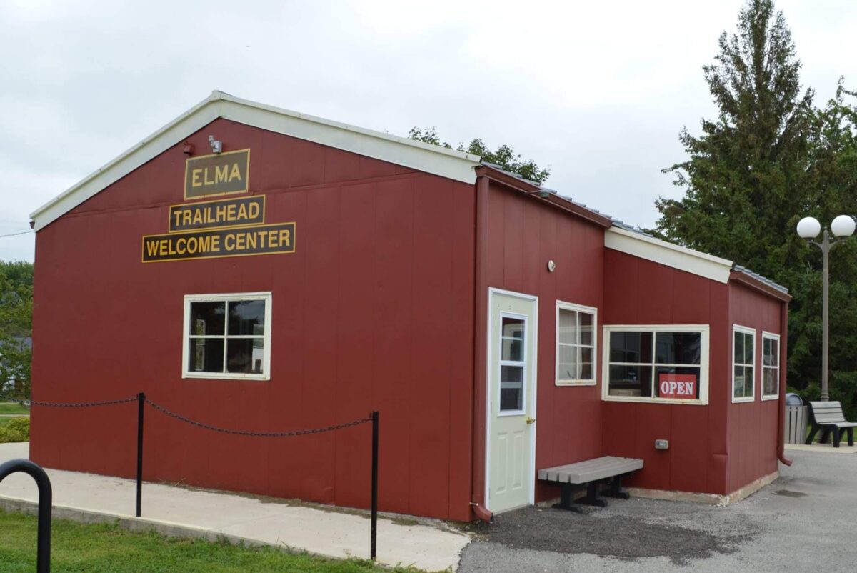 A small red and white building labeled 